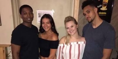 Left to right: Tommie Anderson, Latesha Anderson, Hannah White, and Derrick White. All are wearing casual attire.