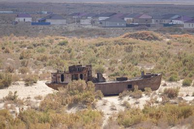 Aral Sea in Uzbekistan - ship graveyard in the sandy desert Aralkum
