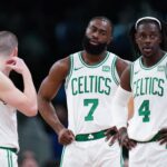 Feb 1, 2024; Boston, Massachusetts, USA; Boston Celtics guard Jrue Holiday (4), guard Jaylen Brown (7), guard Payton Pritchard (11) and guard Derrick White (9) on the court against the Los Angeles Lakers in the second half at TD Garden. Mandatory Credit: David Butler II-USA TODAY Sports