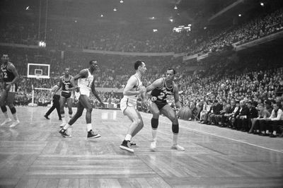 Elgin Baylor Battling Bob Cousy