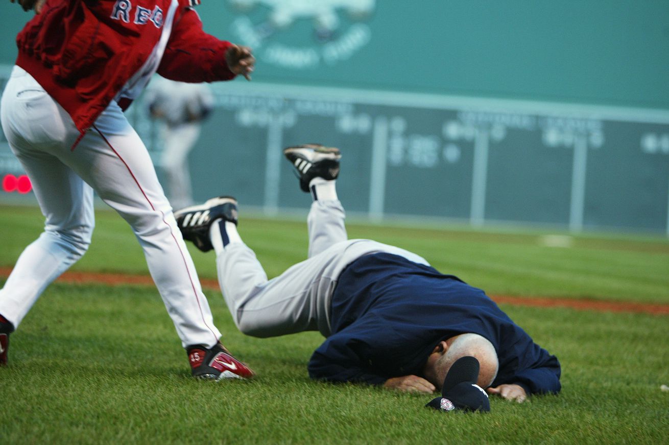 Boston Red Sox’ pitcher Pedro Martinez (left) throws 72-year