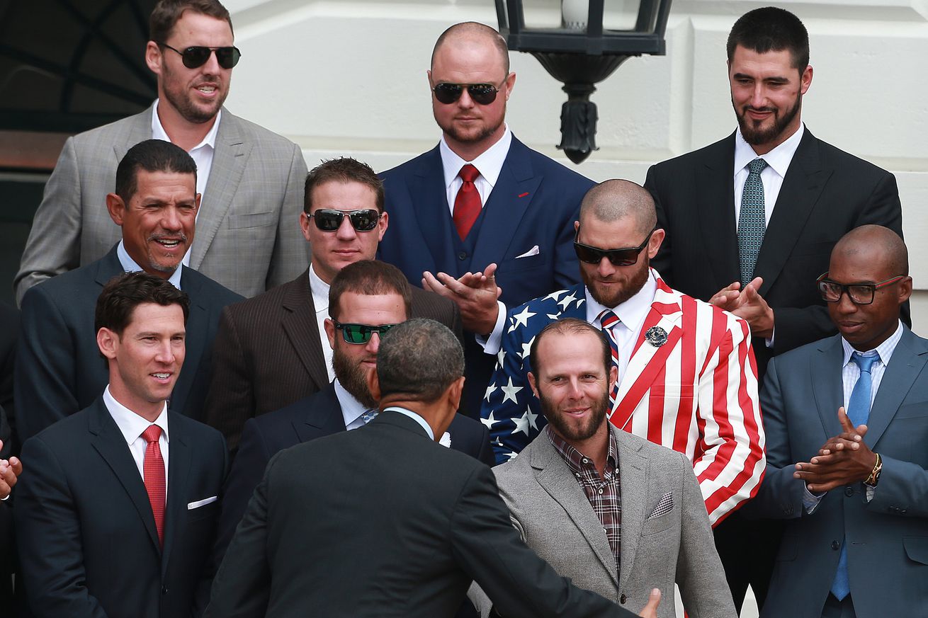 (Washington, DC 04/01/2014) As pitchers John Lackey, Jon Lester, Brandon Workman, pitching coach Juan Nieves, pitcher Jake Peavy, left fielder Jonny Gomes, Jonathan Herrera, Craig Breslow, and Mike Napoli look on, President Barack Obama shakes hand