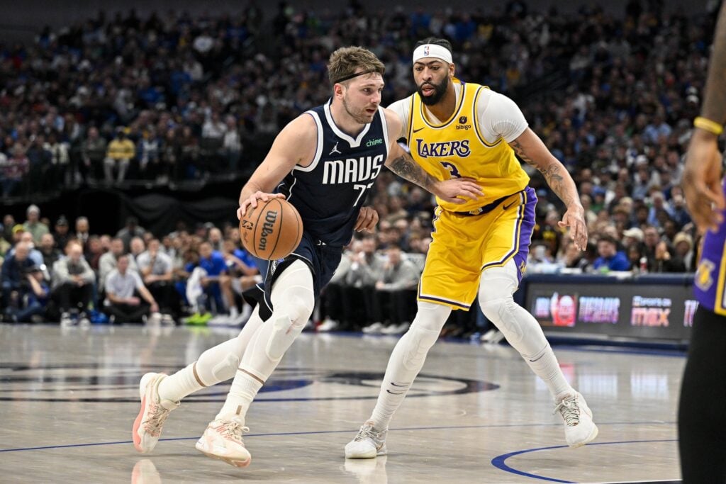Dallas Mavericks guard Luka Doncic (77) and Los Angeles Lakers forward Anthony Davis (3) in action during the game between the Dallas Mavericks and the Los Angeles Lakers at the American Airlines Center.